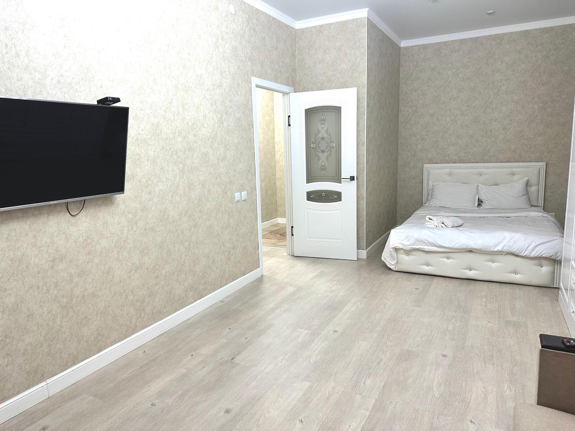 Prego Apartments Astana Номер фото